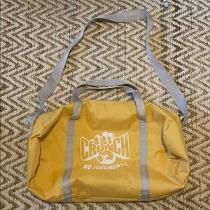 Never used yellow Crunch gym bag